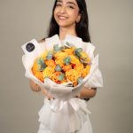 Rose Confidential Orange Blooms